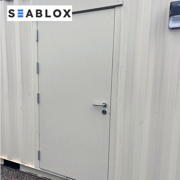 Installed shipping container man door for outdoor container projects in Texas